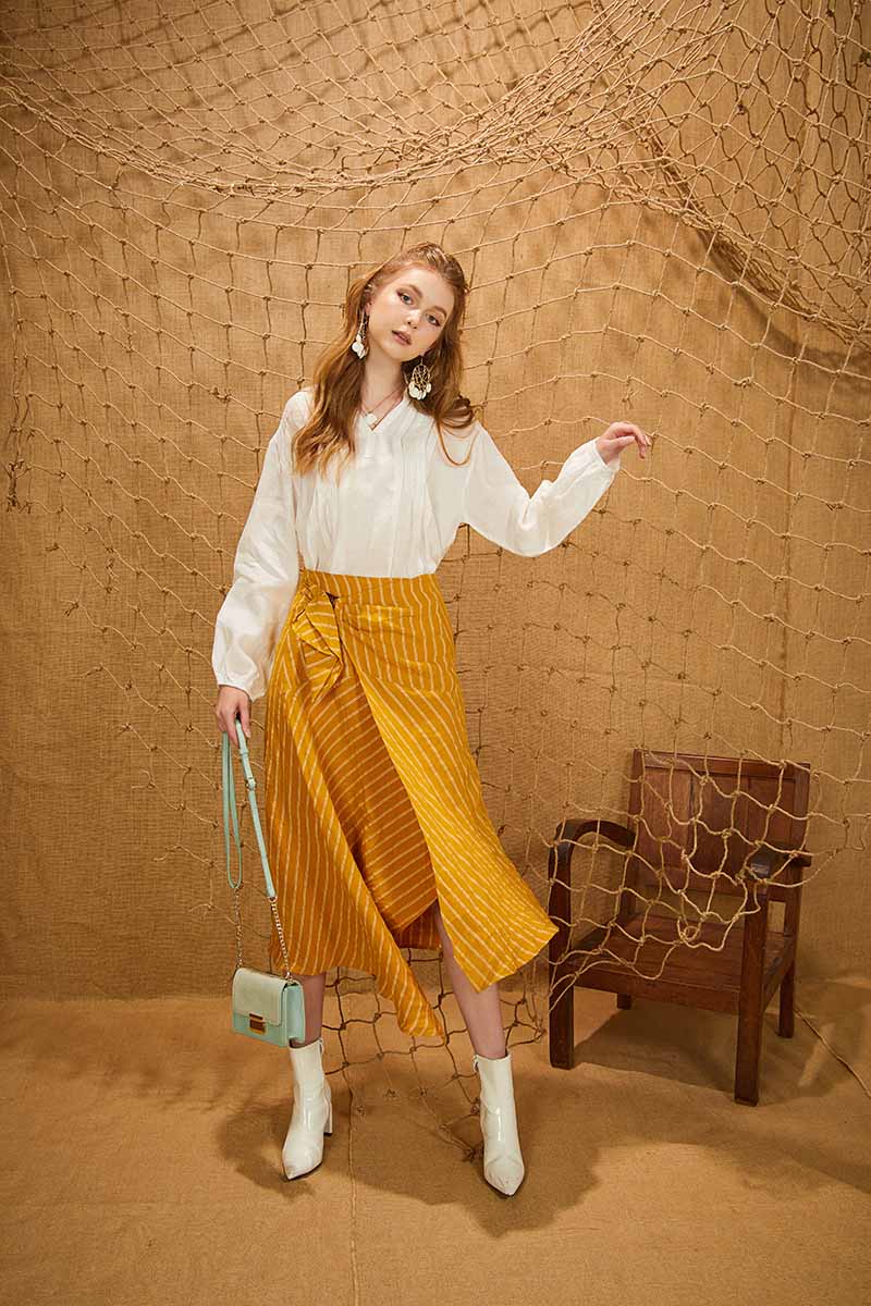 Boots cao cổ khiến cho set đồ trở nên “cool ngầu”