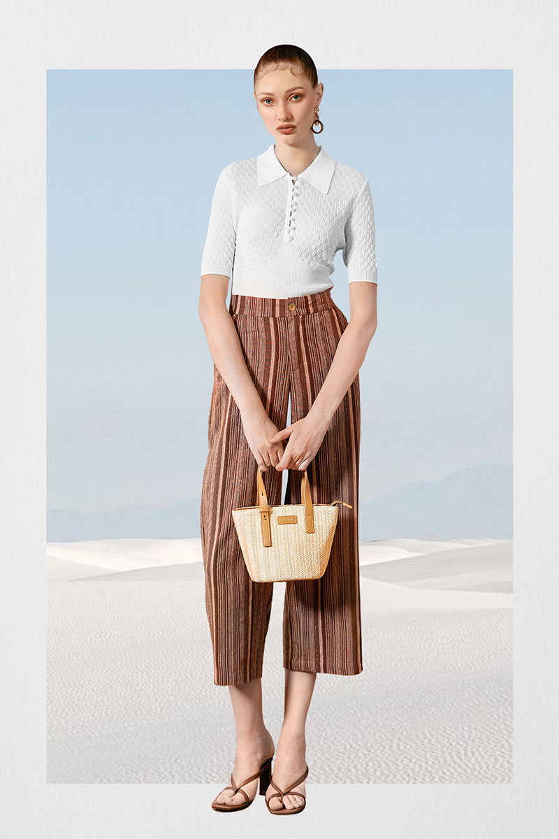 Bạn cũng có thể tìm đến thiết kế mới mẻ hơn với chiếc quần culottes kẻ sọc