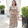 Đầm can dúm eo cổ tàu nhiều cúc bọc Print